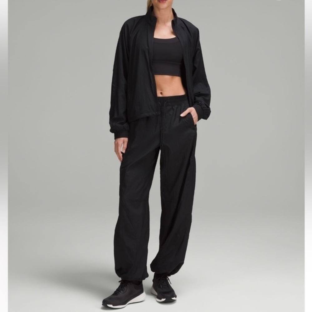 Lululemon 6 black License to Train High Rise Pant w cinch waist & elastic ankle